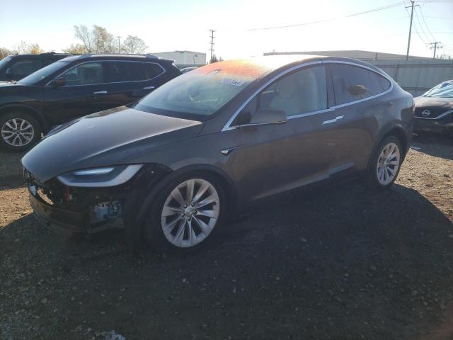 TESLA MODEL X 2016 with VIN 5YJXCAE29GF023830 - Photo from auction