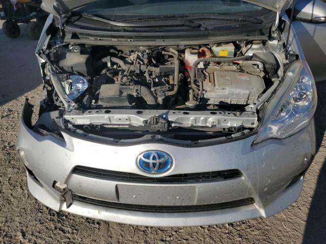 Photo 11 from auction – 2014 TOYOTA PRIUS C with VIN JTDKDTB32E1560156