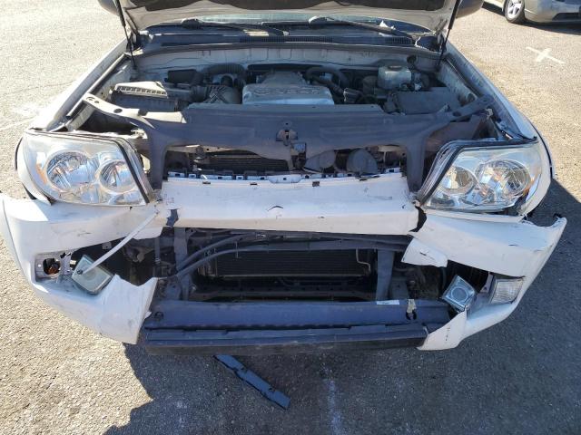 Photo 11 from auction – 2004 TOYOTA 4RUNNER SR with VIN JTEBT14R448015506
