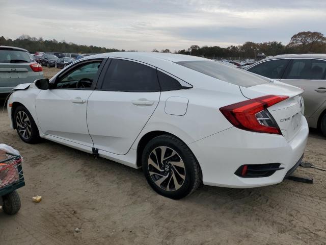 Photo 2 from auction – 2017 HONDA CIVIC LX with VIN 2HGFC2F50HH523057