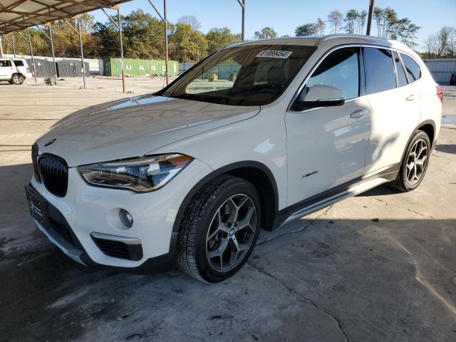 BMW X1 XDRIVE2 2016 with VIN WBXHT3C34G5E53879 - Photo from auction