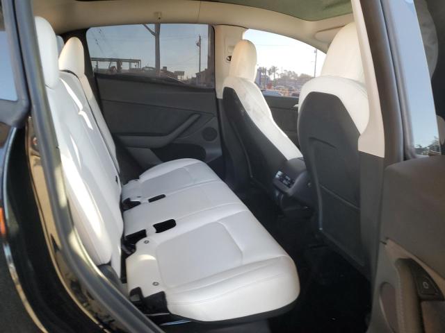Photo 11 from auction – 2022 TESLA MODEL Y with VIN 7SAYGDEEXNF550568