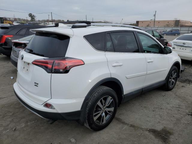 Photo 3 from auction – 2016 TOYOTA RAV4 XLE with VIN 2T3RFREV8GW473259