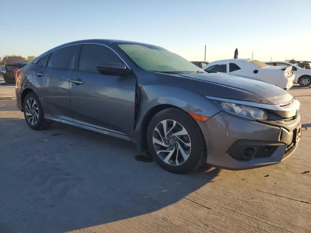 Photo 4 from auction – 2018 HONDA CIVIC LX with VIN 2HGFC2F60JH043180