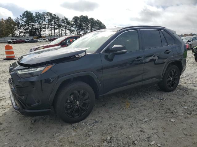 TOYOTA RAV4 SE 2022 with VIN JTM16RFV2ND519321 - Photo from auction