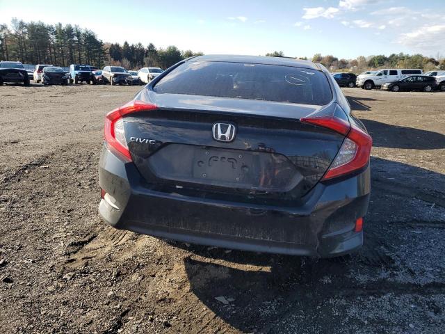 Photo 6 from auction – 2018 HONDA CIVIC LX with VIN 2HGFC2F50JH574872