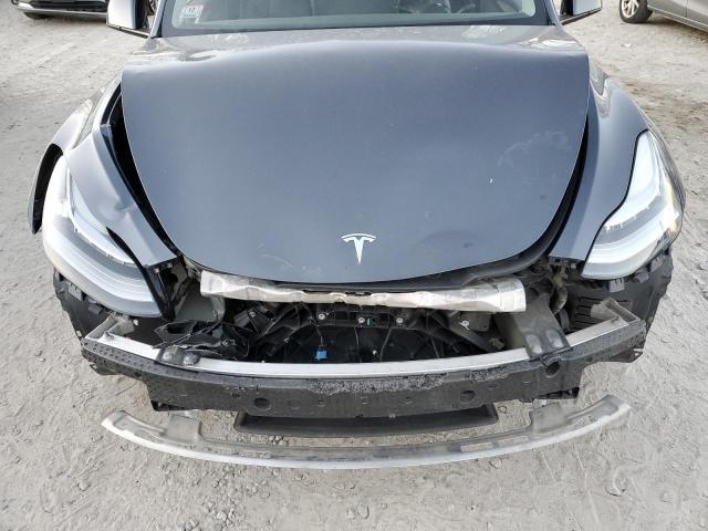Photo 11 from auction – 2023 TESLA MODEL Y with VIN 7SAYGDEE4PA029572