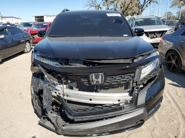 Photo 5 from auction – 2021 HONDA PASSPORT E with VIN 5FNYF8H08MB035431
