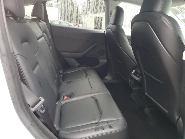Photo 11 from auction – 2023 TESLA MODEL Y with VIN 7SAYGDEE0PF749423