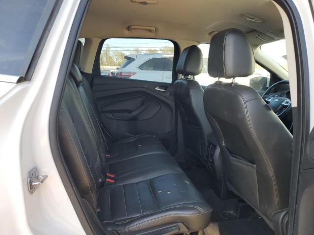 Photo 10 from auction – 2014 FORD ESCAPE TIT with VIN 1FMCU0J92EUE37900