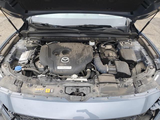 Photo 12 from auction – 2023 MAZDA CX-50 BASE with VIN 7MMVABXY3PN140793