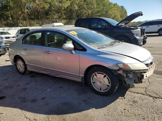 Photo 4 from auction – 2010 HONDA CIVIC HYBR with VIN JHMFA3F25AS002610