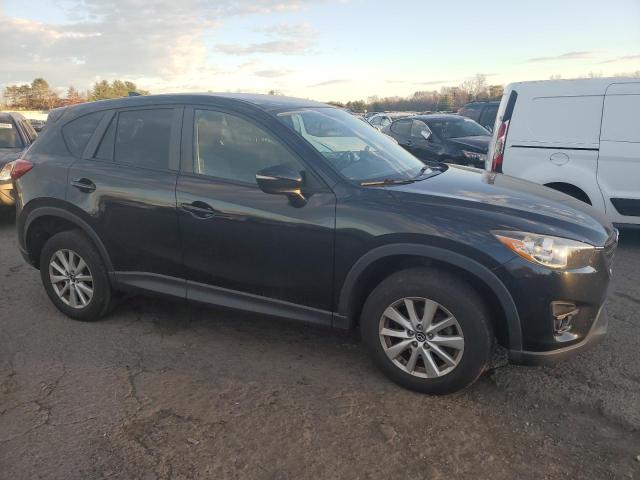 Photo 4 from auction – 2016 MAZDA CX-5 TOURI with VIN JM3KE4CY9G0745656