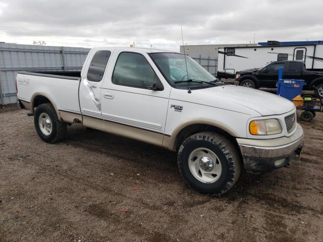 Photo 4 from auction – 2000 FORD F150 with VIN 1FTRX18L6YNB73575