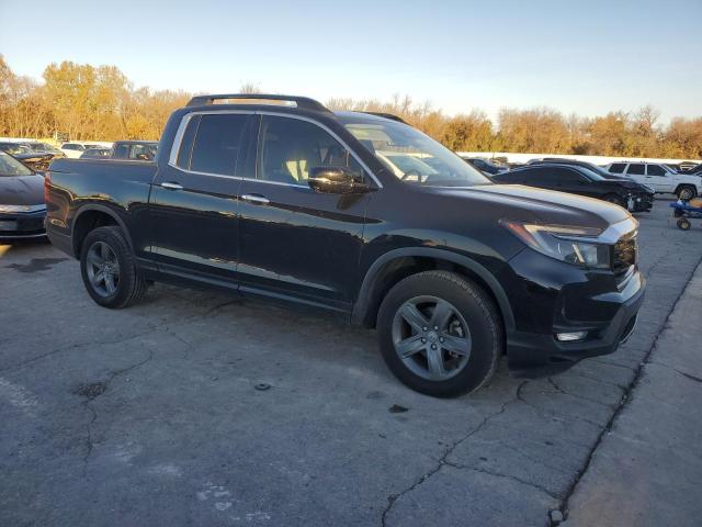 Photo 4 from auction – 2021 HONDA RIDGELINE with VIN 5FPYK3F72MB026746