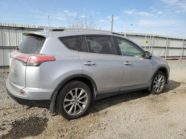 Photo 3 from auction – 2018 TOYOTA RAV4 LIMIT with VIN JTMDFREV7JD231495