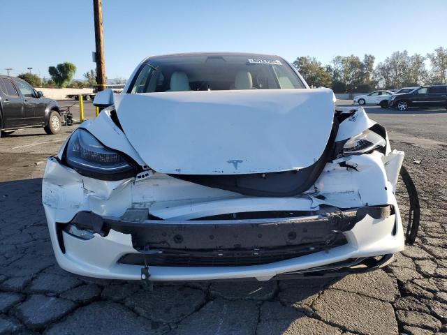 Photo 5 from auction – 2020 TESLA MODEL Y with VIN 5YJYGDEE1LF017728