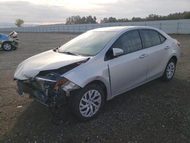 TOYOTA COROLLA L 2019 with VIN 5YFBURHE3KP884610 - Photo from auction