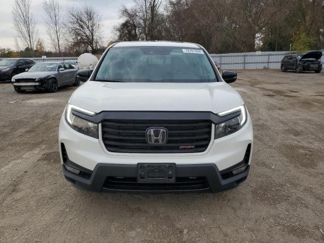 Photo 5 from auction – 2021 HONDA RIDGELINE with VIN 5FPYK3F10MB501662