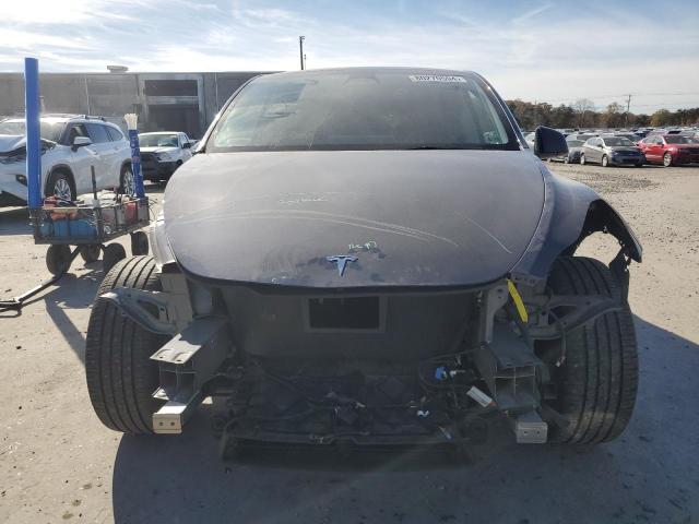 Photo 5 from auction – 2023 TESLA MODEL Y with VIN 7SAYGDEE9PA028935