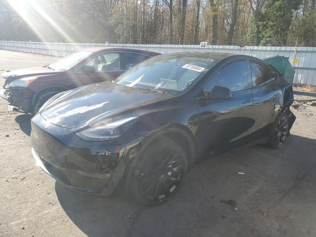 TESLA MODEL Y 2023 with VIN 7SAYGDEE1PF850759 - Photo from auction