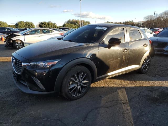 MAZDA CX-3 TOURI 2018 with VIN JM1DKFC7XJ1310417 - Photo from auction