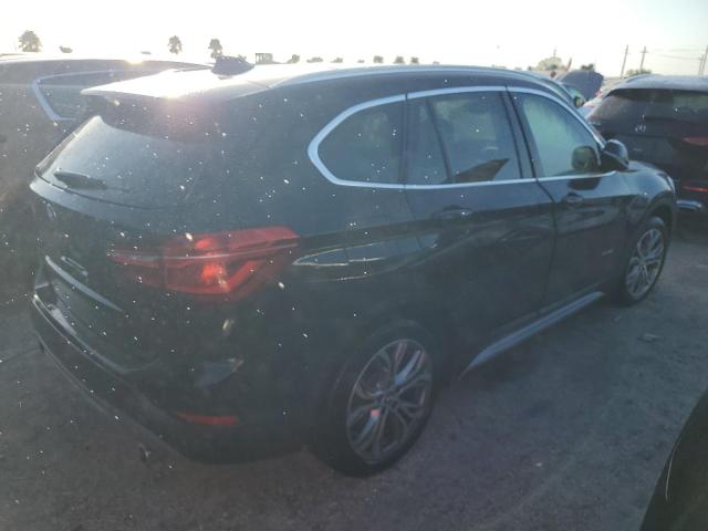 Photo 3 from auction – 2017 BMW X1 XDRIVE2 with VIN WBXHT3Z38H4A52303