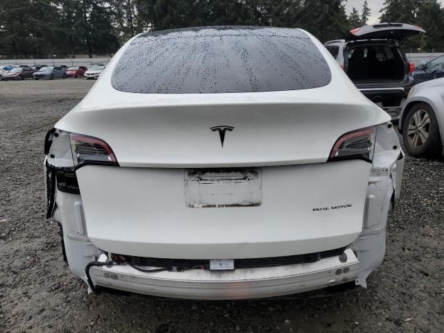 Photo 6 from auction – 2023 TESLA MODEL Y with VIN 7SAYGAEE3PF811654