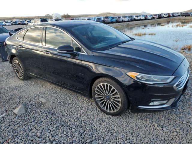 Photo 4 from auction – 2018 FORD FUSION TIT with VIN 3FA6P0D92JR169510
