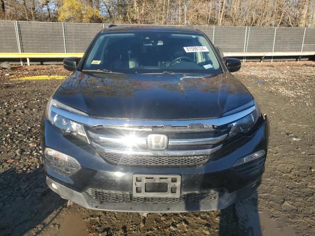 Photo 5 from auction – 2018 HONDA PILOT ELIT with VIN 5FNYF6H06JB053975
