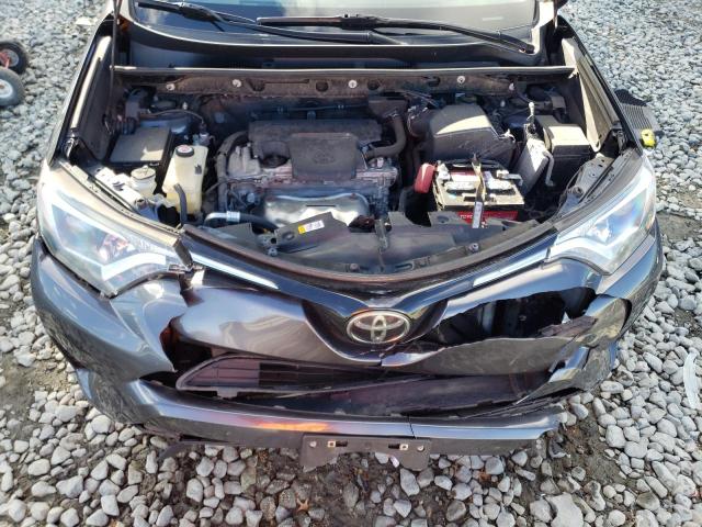 Photo 12 from auction – 2018 TOYOTA RAV4 LE with VIN JTMBFREV9JJ233211