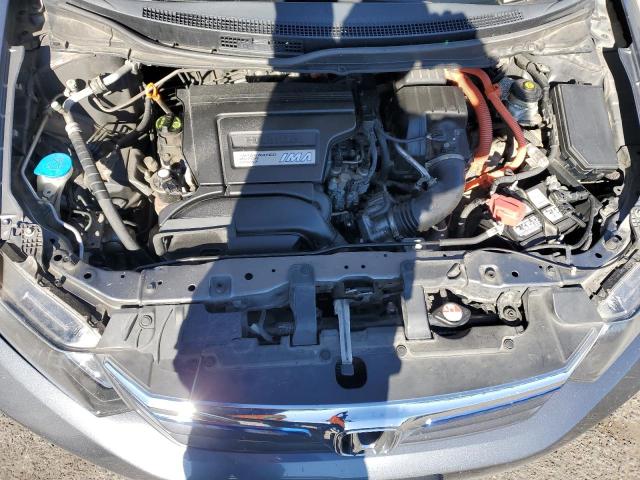 Photo 11 from auction – 2012 HONDA CIVIC HYBR with VIN JHMFB4F22CS011013