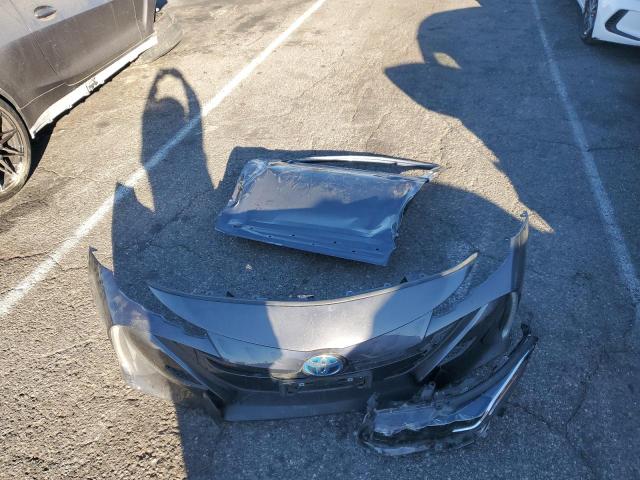 Photo 12 from auction – 2018 TOYOTA PRIUS PRIM with VIN JTDKARFP5J3082726