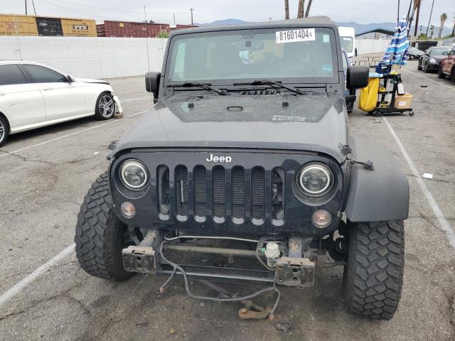 Photo 5 from auction – 2014 JEEP WRANGLER U with VIN 1C4BJWDG9EL201417