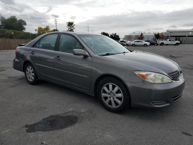 Photo 4 from auction – 2002 TOYOTA CAMRY LE with VIN JTDBE30K720134407