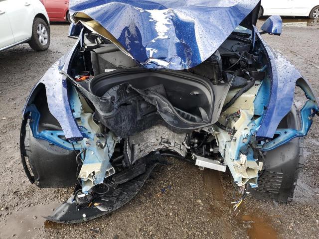 Photo 12 from auction – 2023 TESLA MODEL Y with VIN 7SAYGDEE5PF844110