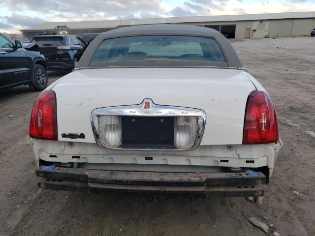 Photo 6 from auction – 2001 LINCOLN TOWN CAR E with VIN 1LNHM81W01Y680425