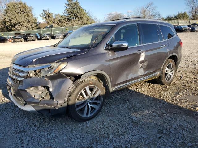 HONDA PILOT ELIT 2016 with VIN 5FNYF6H07GB033243 - Photo from auction