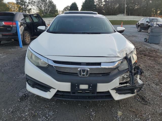 Photo 5 from auction – 2016 HONDA CIVIC EX with VIN 19XFC1F38GE004419