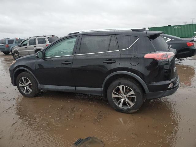 Photo 2 from auction – 2016 TOYOTA RAV4 XLE with VIN 2T3RFREV5GW424889
