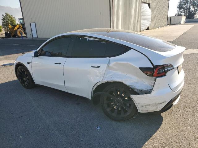 Photo 2 from auction – 2020 TESLA MODEL Y with VIN 5YJYGDEE9LF055532