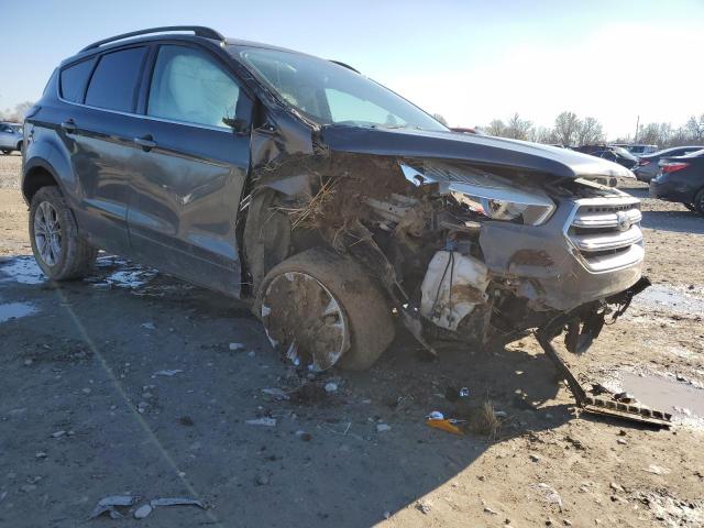 Photo 4 from auction – 2018 FORD ESCAPE SE with VIN 1FMCU9GDXJUA29509