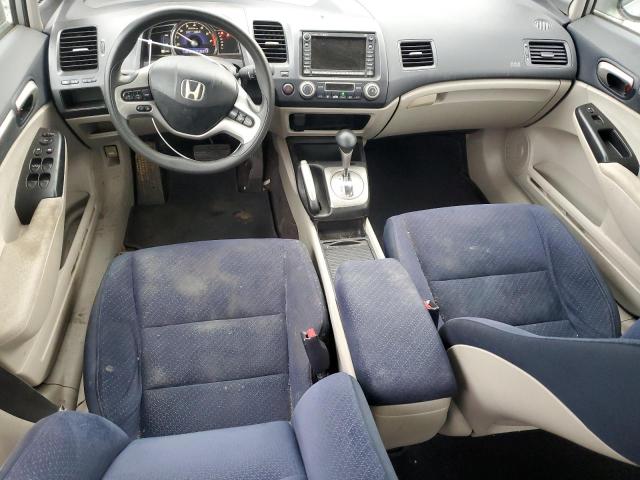 Photo 8 from auction – 2006 HONDA CIVIC HYBR with VIN JHMFA36256S012139