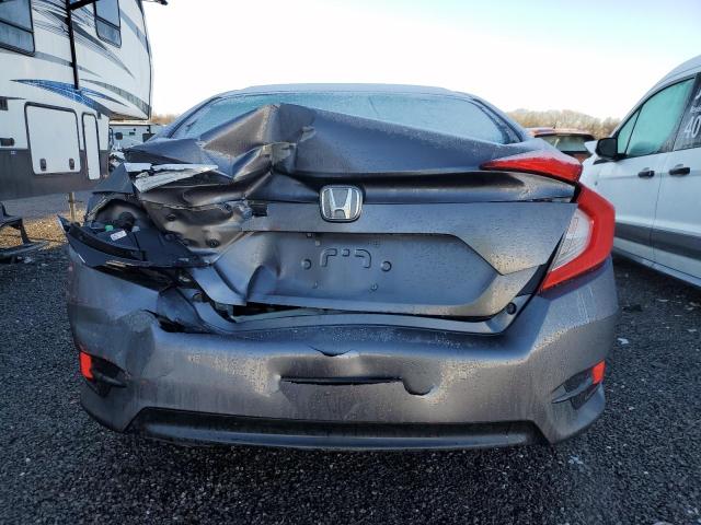 Photo 6 from auction – 2016 HONDA CIVIC LX with VIN 19XFC2F53GE005372
