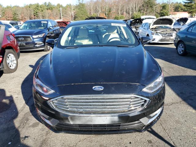 Photo 5 from auction – 2018 FORD FUSION TIT with VIN 3FA6P0D98JR247143