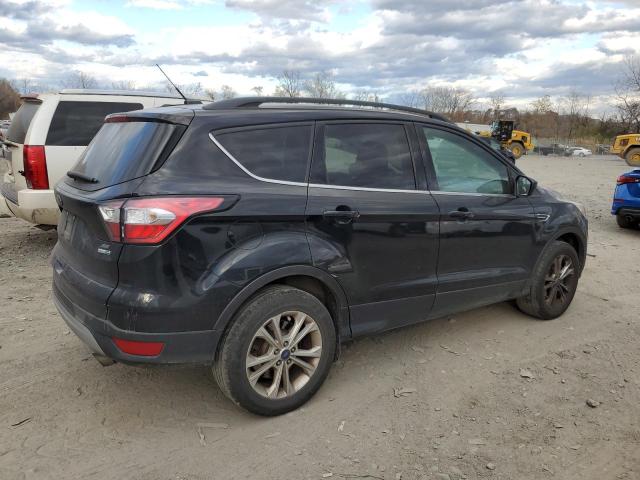 Photo 3 from auction – 2017 FORD ESCAPE SE with VIN 1FMCU9GD1HUD48100