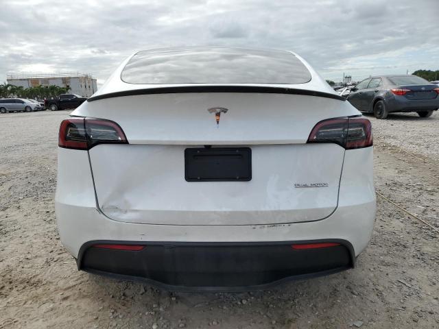 Photo 6 from auction – 2023 TESLA MODEL Y with VIN 7SAYGDEF8PF899630
