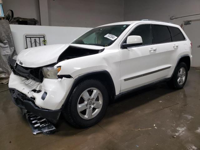 JEEP GRAND CHER 2011 with VIN 1J4RS4GG8BC615564 - Photo from auction