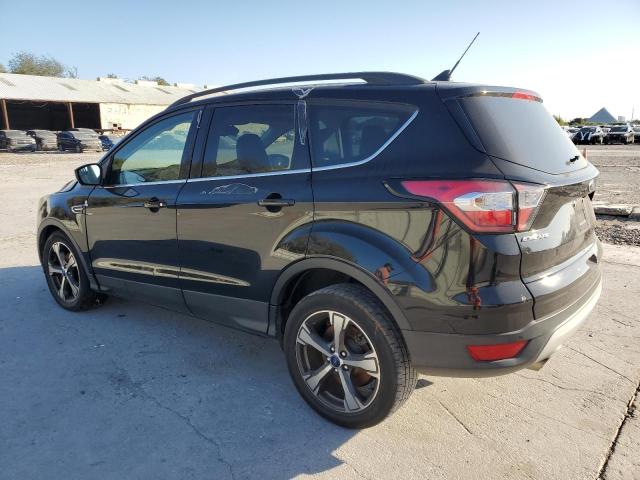 Photo 2 from auction – 2018 FORD ESCAPE SEL with VIN 1FMCU0HD1JUB67644
