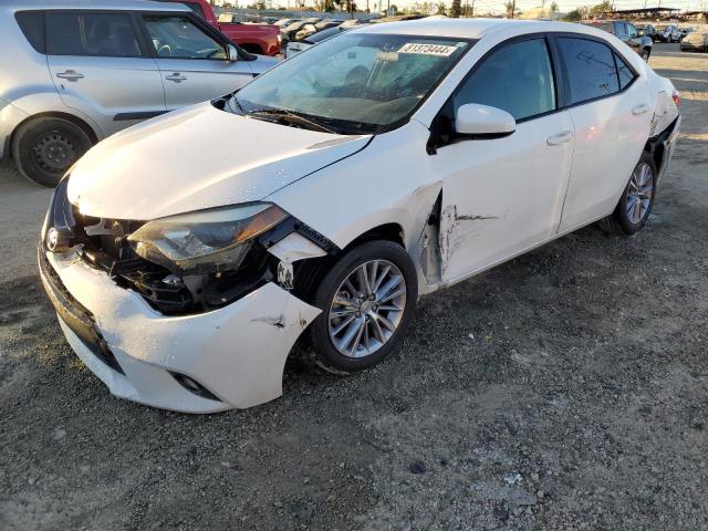 TOYOTA COROLLA L 2014 with VIN 5YFBURHEXEP060253 - Photo from auction